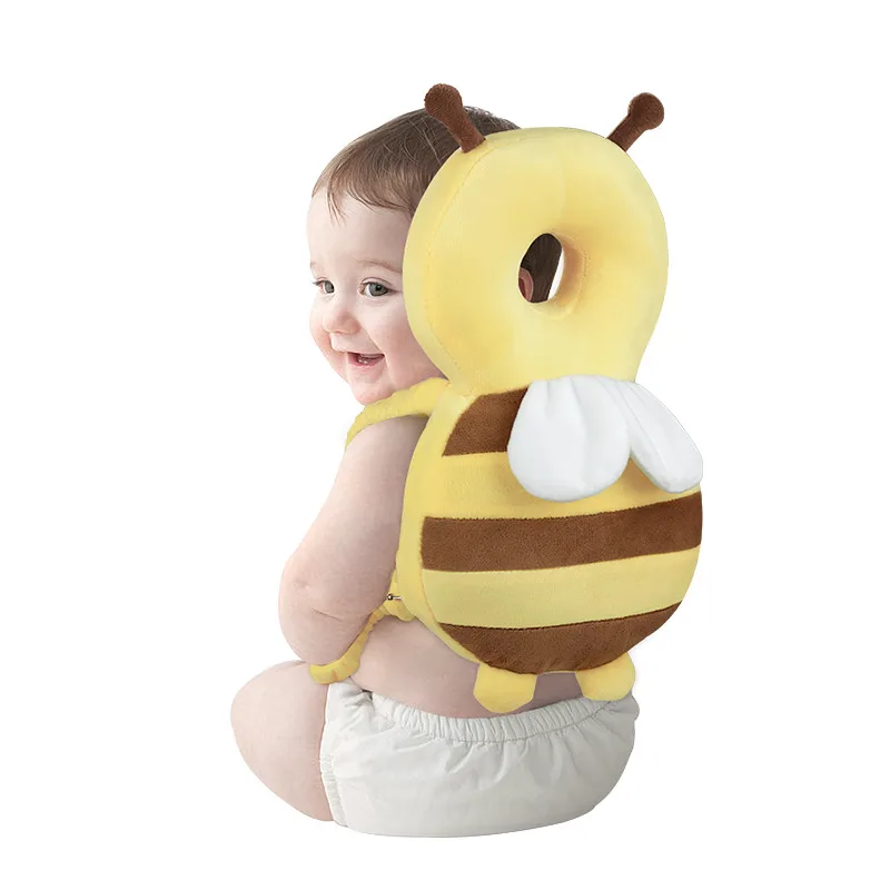 Toddler wearing the bee head cushion backpack